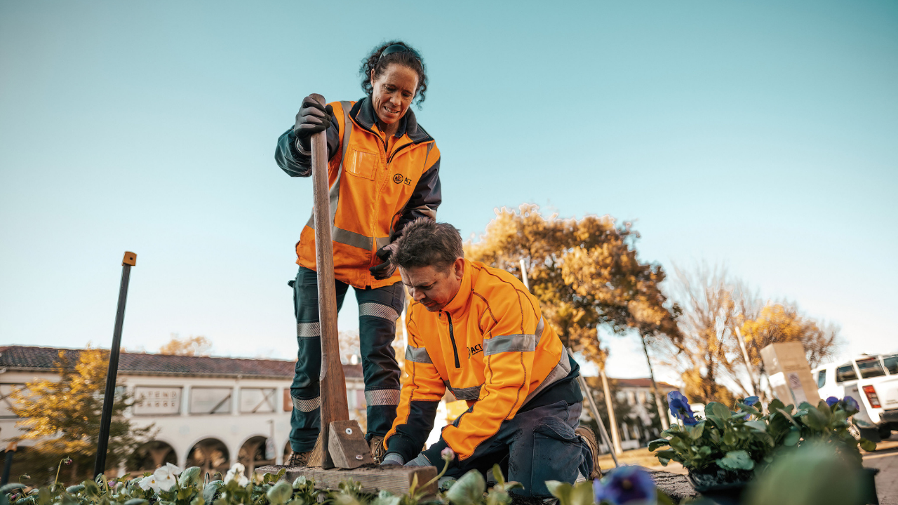 The Place Team planting seasonal flowers