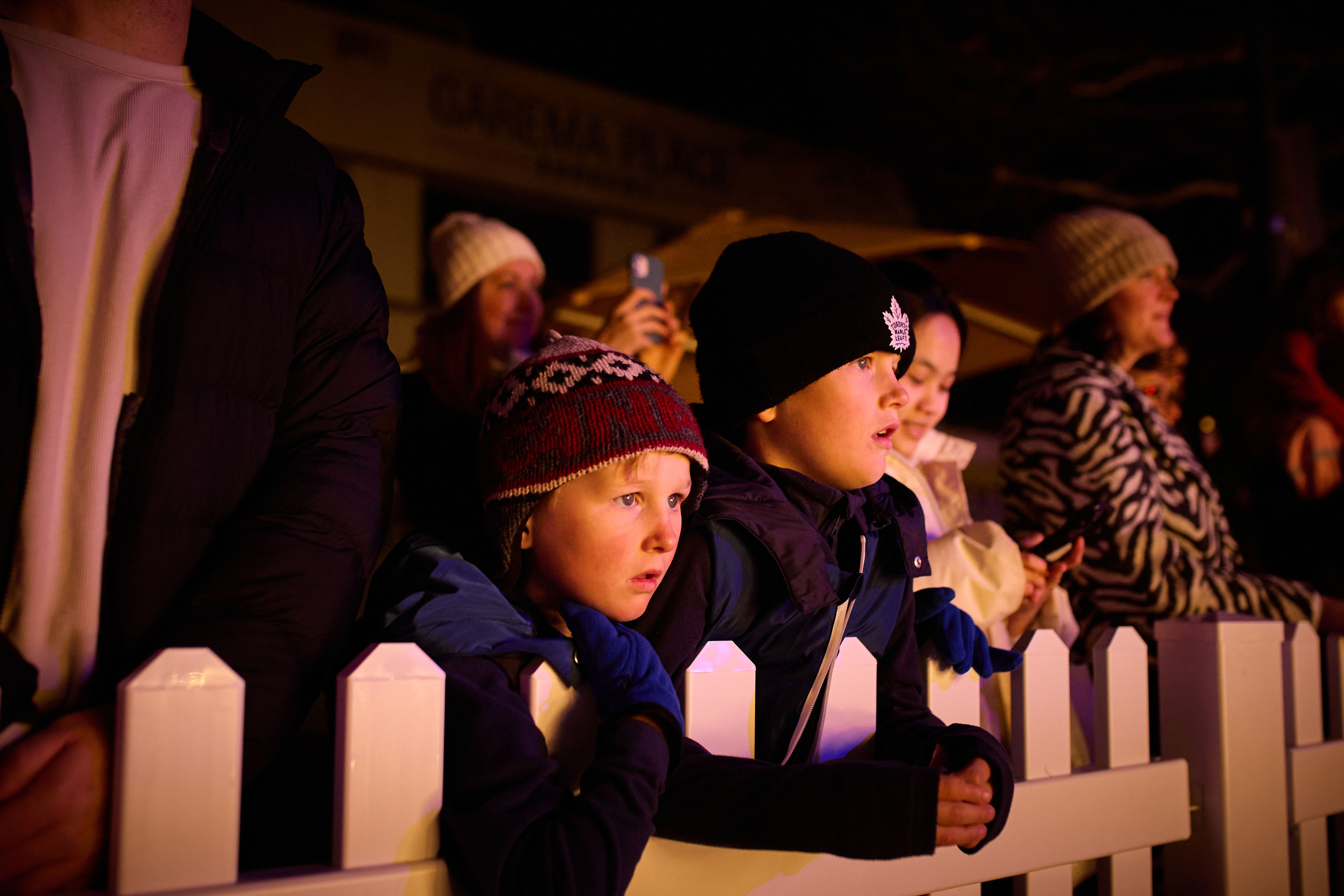 Two children enjoying the fire performances