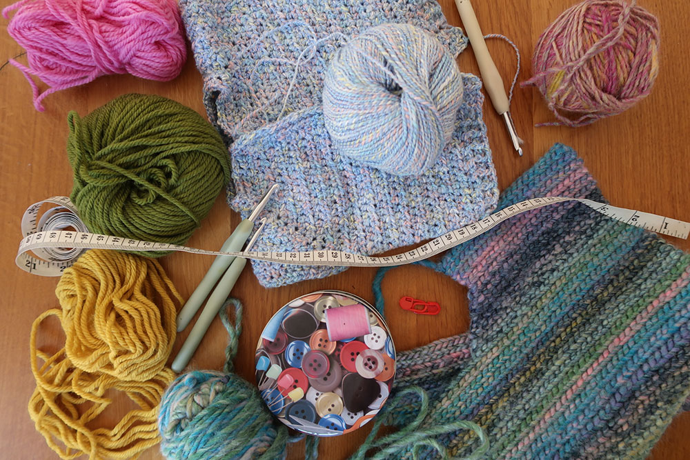 A range of crafting supplies spread on a table