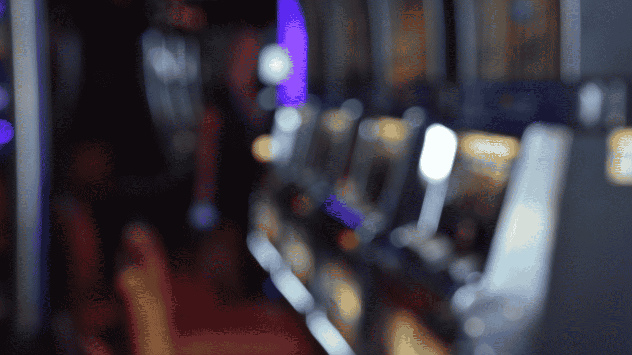 Blurred row of poker machines.