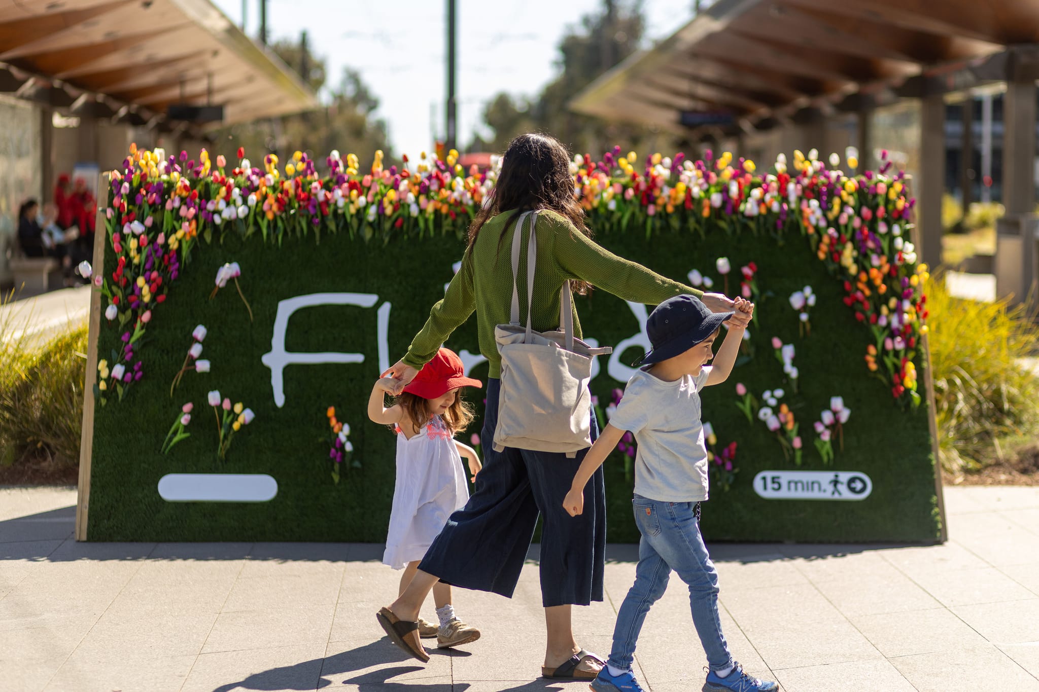 A family visits the Floriade Walking Trail in the City Centre