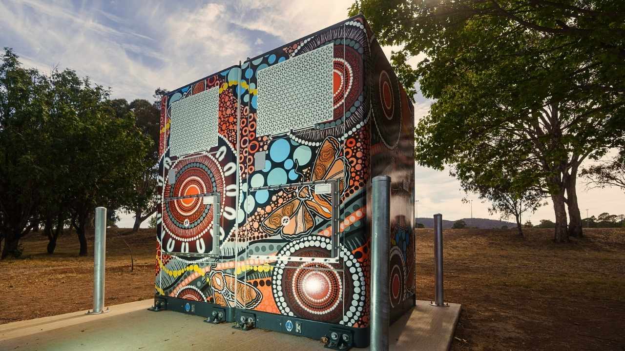 A large-scale battery featuring indigenous artwork.