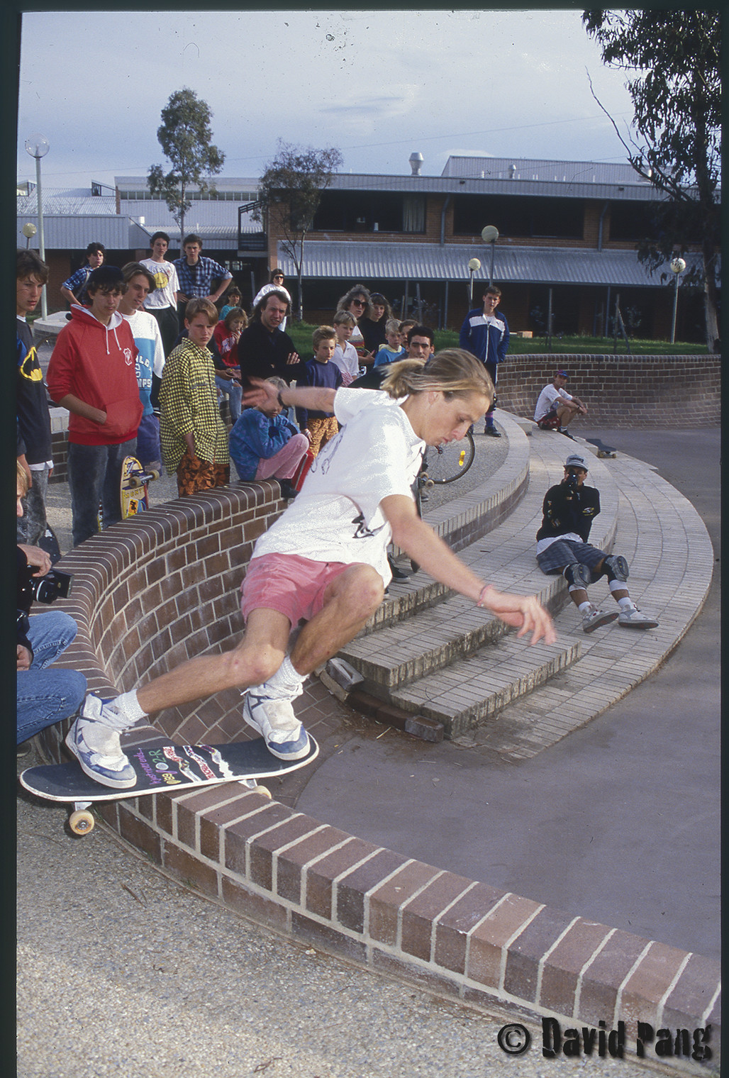 A young man skateboarding